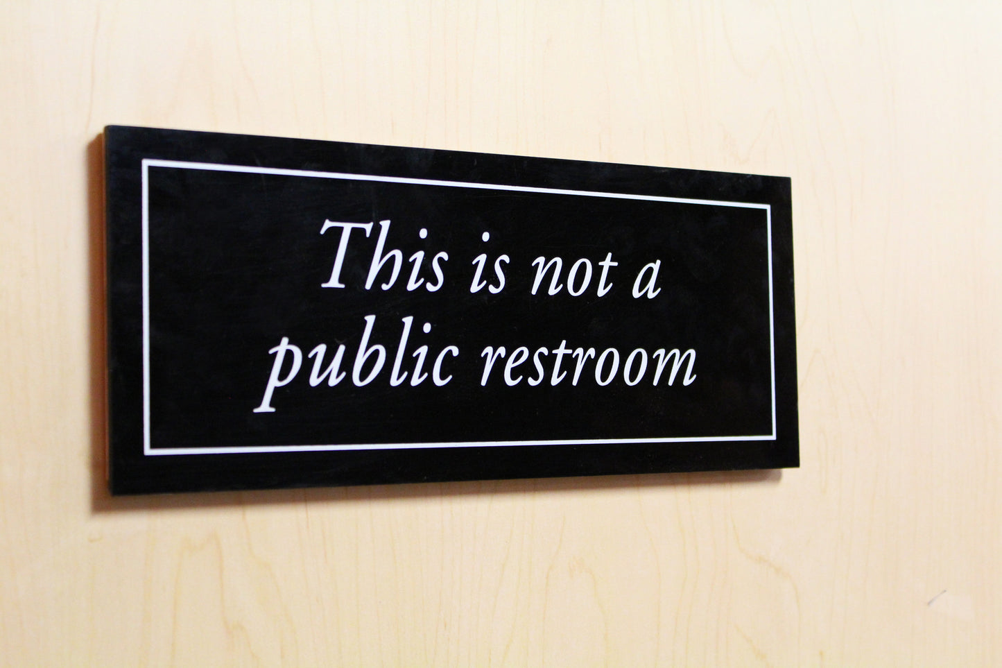 "This is not a public restroom" Plaque